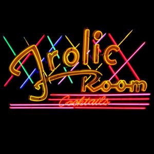 The neon sign for The Frolic Room bar on Hollywood Boulevard in Los Angeles on a Hollywood Food Tour run by To Live and Dine in LA Food Tours.